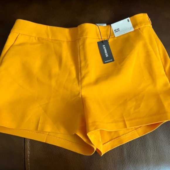 Express Pants - NWT Express Mid Rise Shortie size 8 color orange - side zip and slant pockets